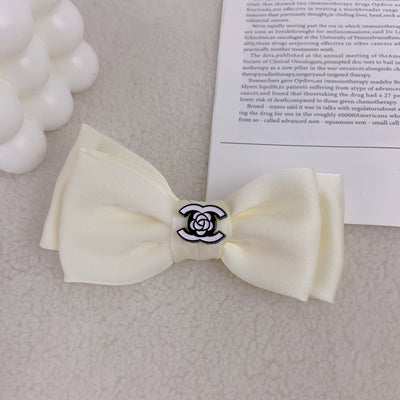 CC Fancy Hair Vibrant Bow tie Clip