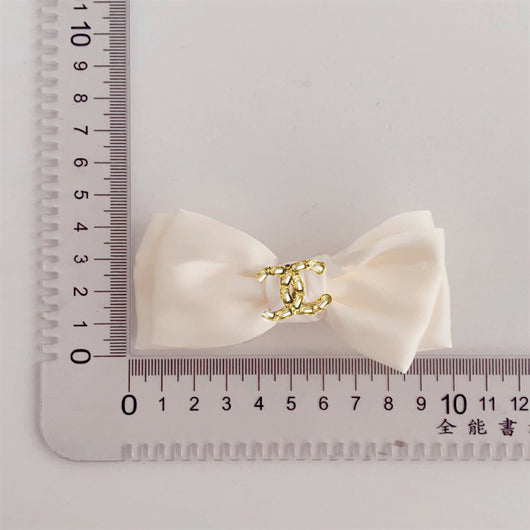 CC Fancy Hair Vibrant Bow tie Clip